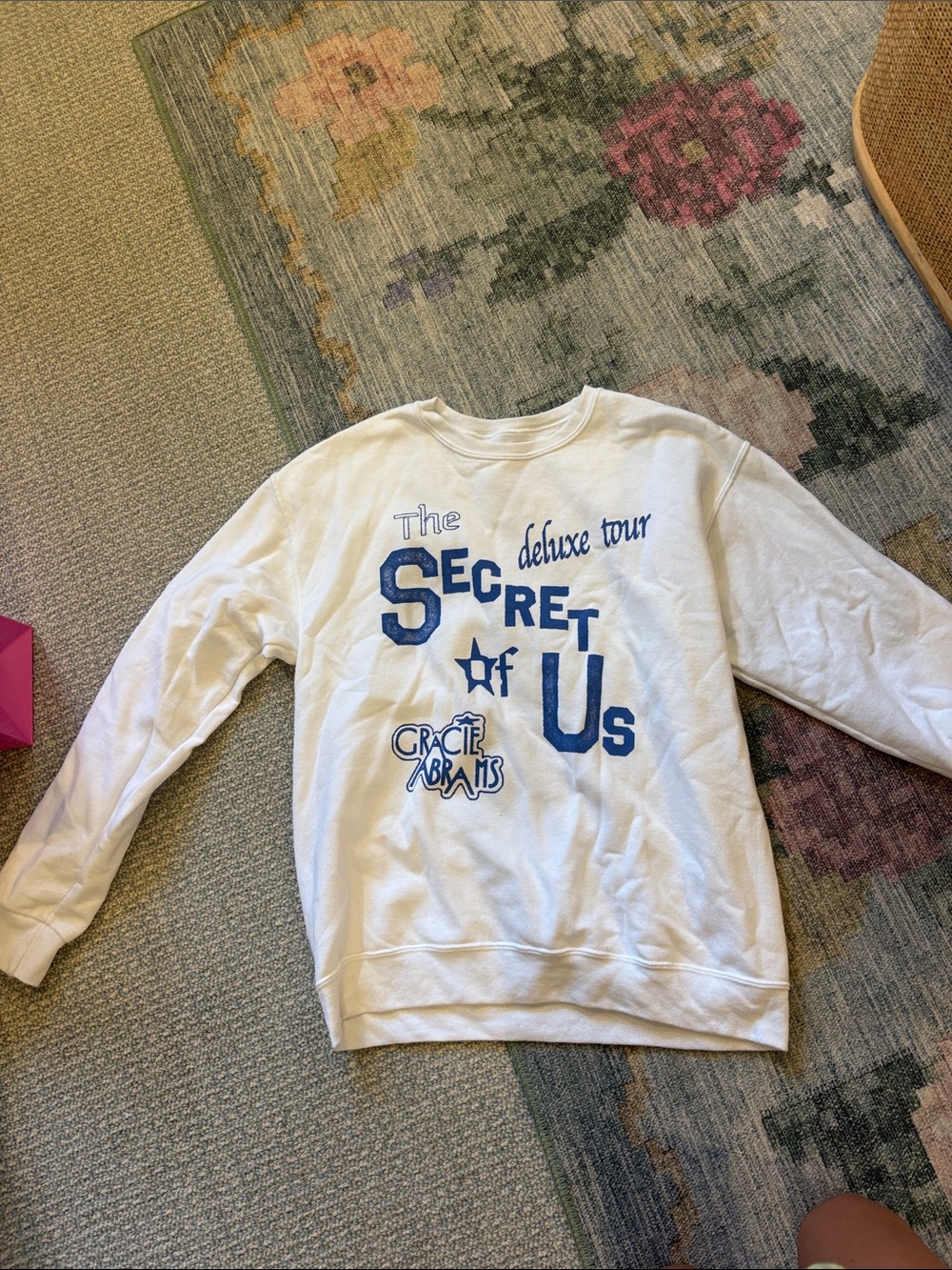 'The Secret of Us' White Graphic Crewneck Sweatshirt